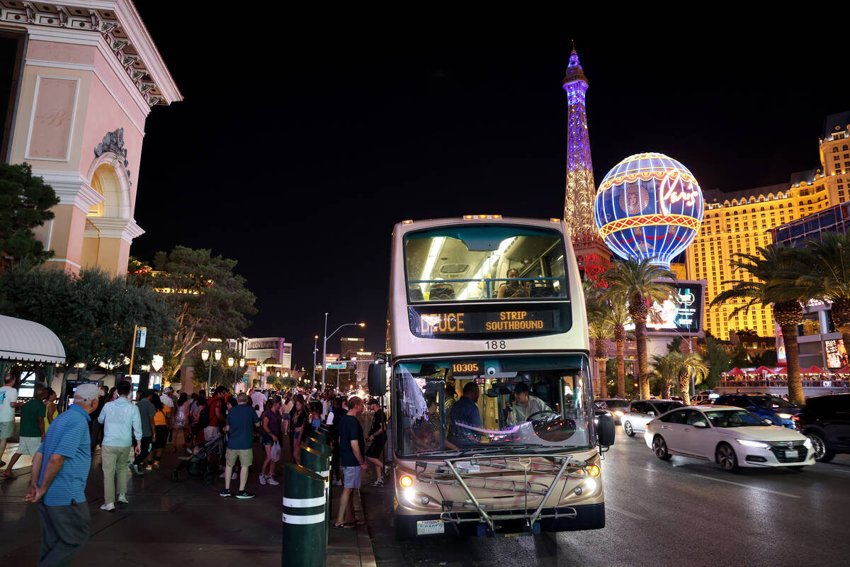 Passengers board a Regional Transportation Commission bus on the Strip in Las Vegas Thursday, J ...