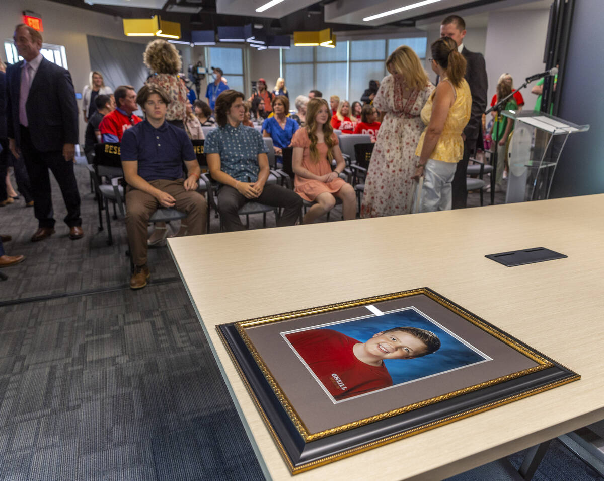 A photo of Rex Patchett sits on a table as Nevada Gov. Joe Lombardo, members of Henderson city ...