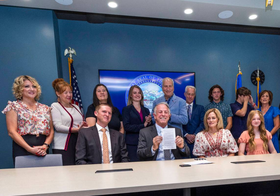 Nevada Gov. Joe Lombardo conducts a ceremonial signing of SB 322 aka Rex's Law about members of ...