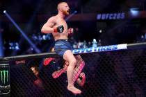 Bo Nickal celebrates his submission win against Jamie Pickett in a lightweight bout during UFC ...