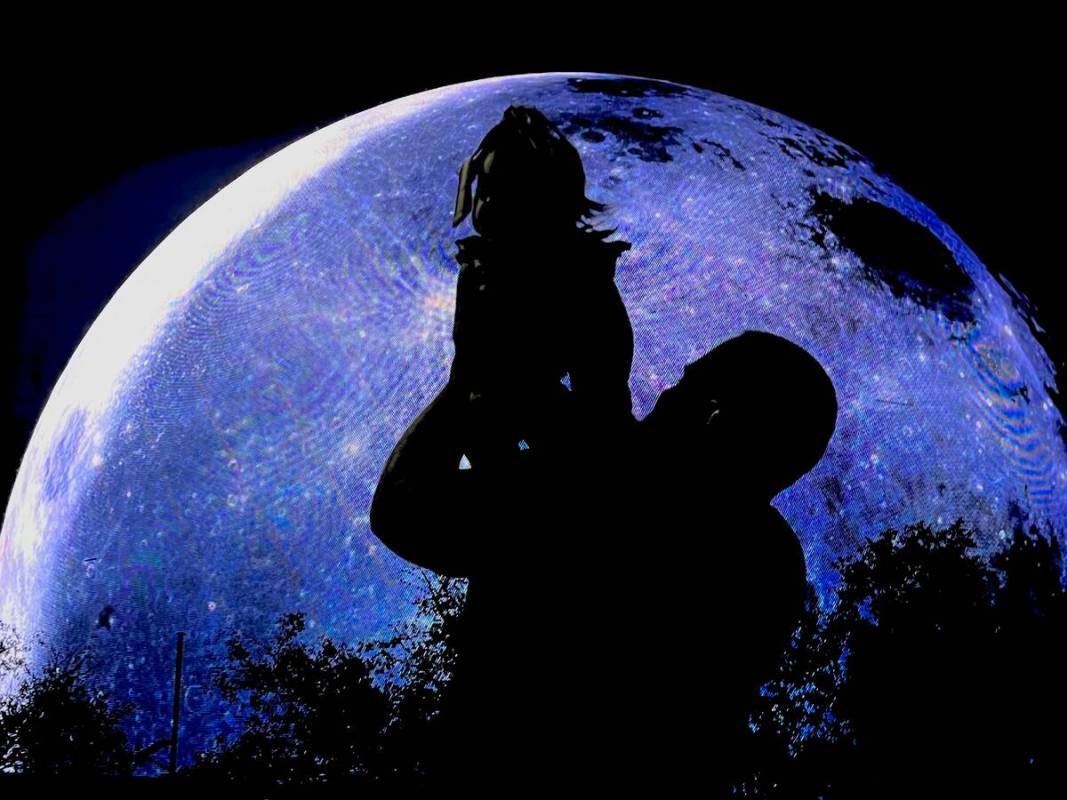 Peter Salazar holds daughter Meylie, 8 months, during the Sphere July 4th fireworks show on Tue ...