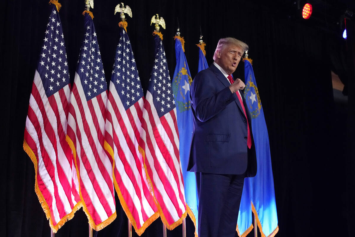 Former President Donald Trump motions before speaking at a campaign event, Saturday, July 8, 20 ...