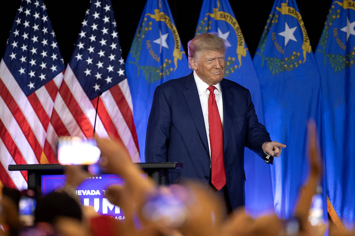 Former President Donald Trump takes the stage during an organizing event at Fervent Calvary Cha ...