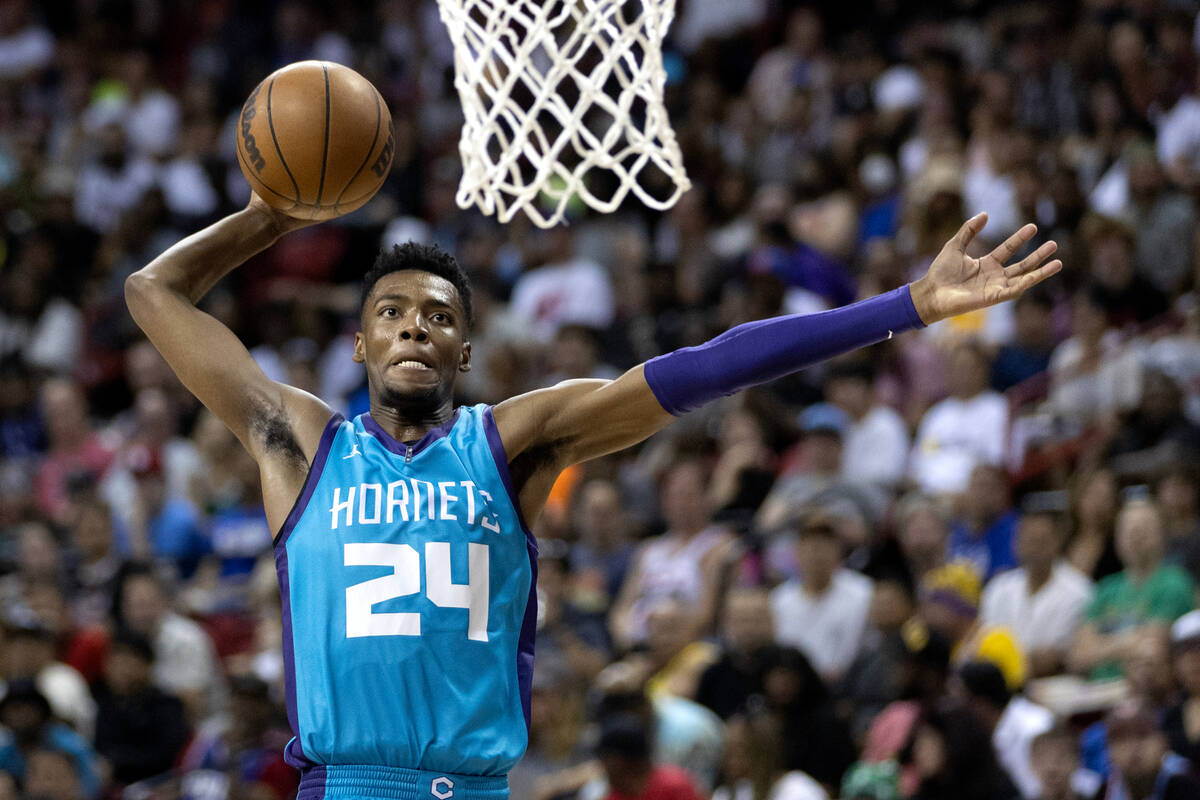 Charlotte Hornets forward Brandon Miller (24) jumps to dunk during an NBA Summer League game ag ...