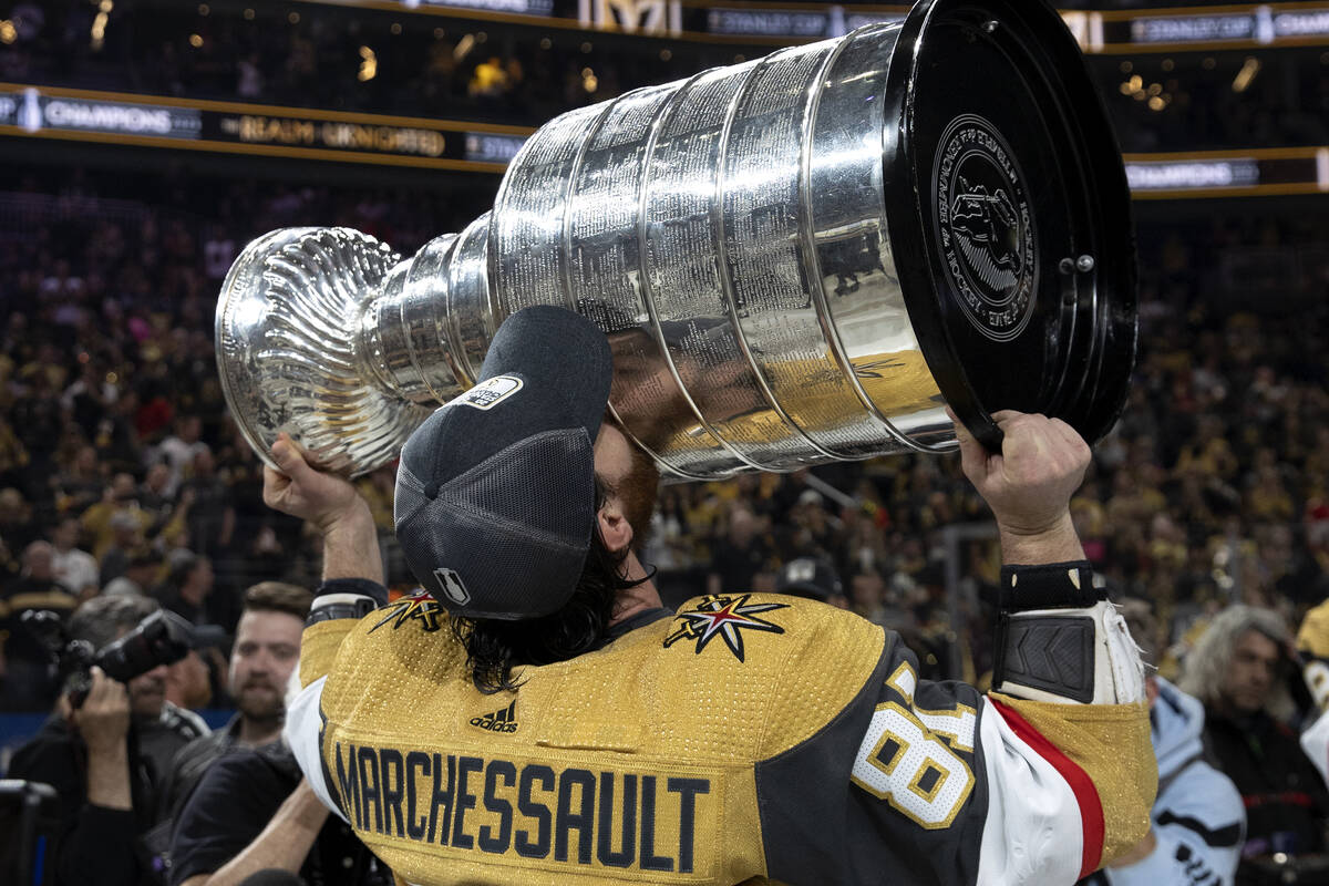 Golden Knights right wing Jonathan Marchessault (81) kisses with the Stanley Cup after winning ...