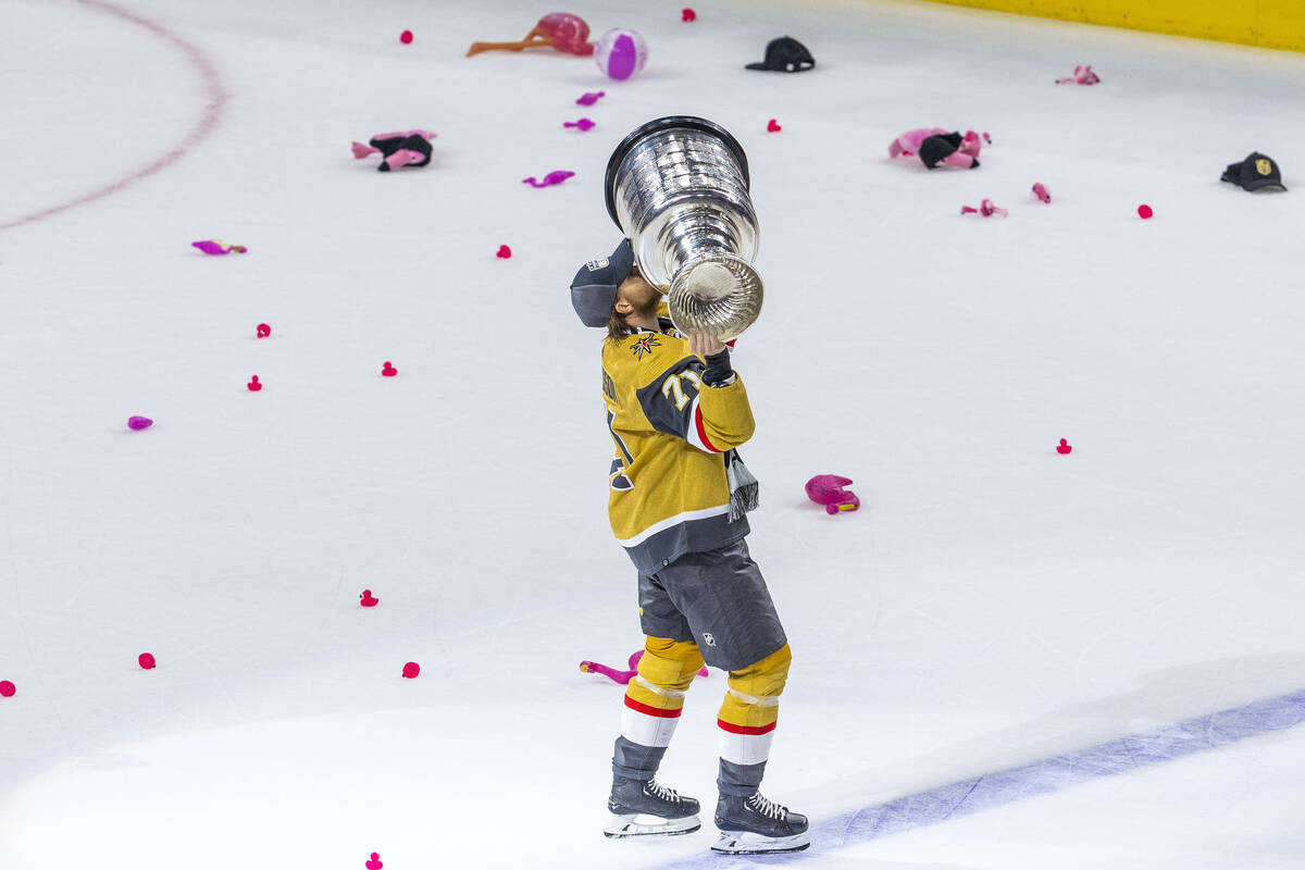 Golden Knights center William Karlsson (71) kisses the Stanley Cup after their 9-3 win over the ...