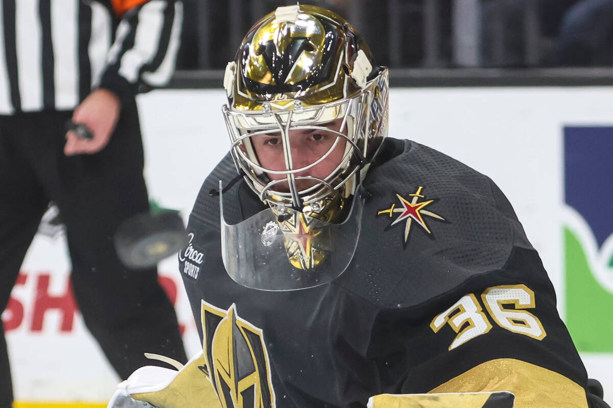 Golden Knights goaltender Logan Thompson (36) watches the puck rebound off a blocked shot from ...