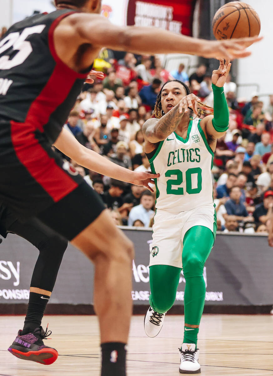 Boston Celtics guard J.D. Davison passes the ball to a teammate during an NBA Summer League gam ...