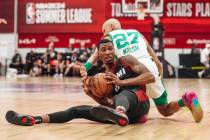 Boston Celtics forward Jamal Cain (8) keeps the ball away from Boston Celtics forward Jordan Wa ...