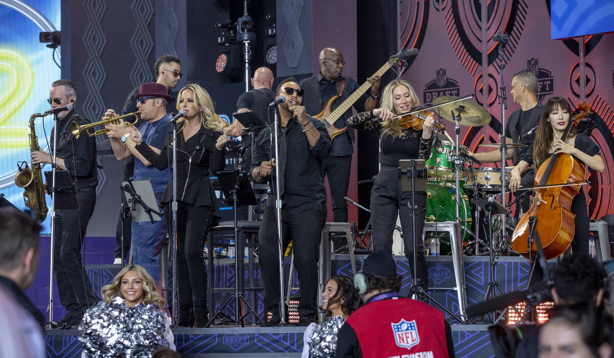 David Perrico 19-piece Raiders House Band performs at the Draft Theater during the second day s ...