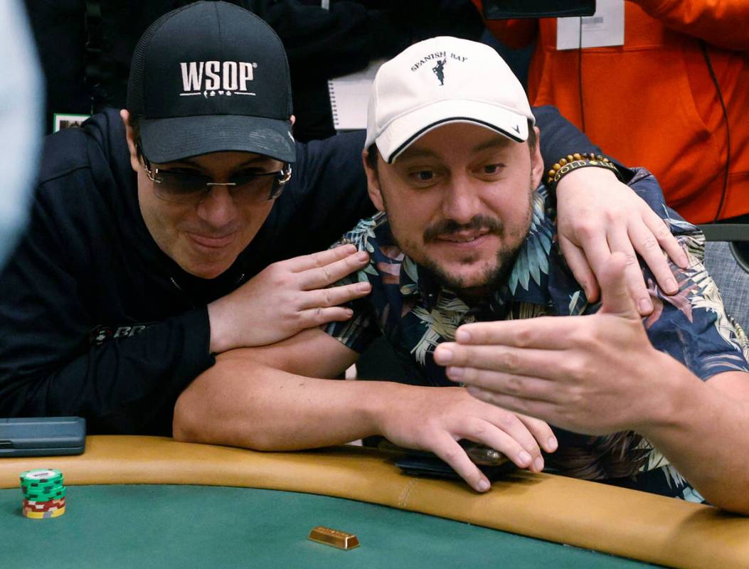 Jamie Gold, winner of World Series of Poker in 2006, left, speaks to Jordan Westmorland, during ...