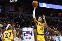 Los Angeles Lakers forward Maxwell Lewis (21) goes for a basket during an NBA Summer League gam ...