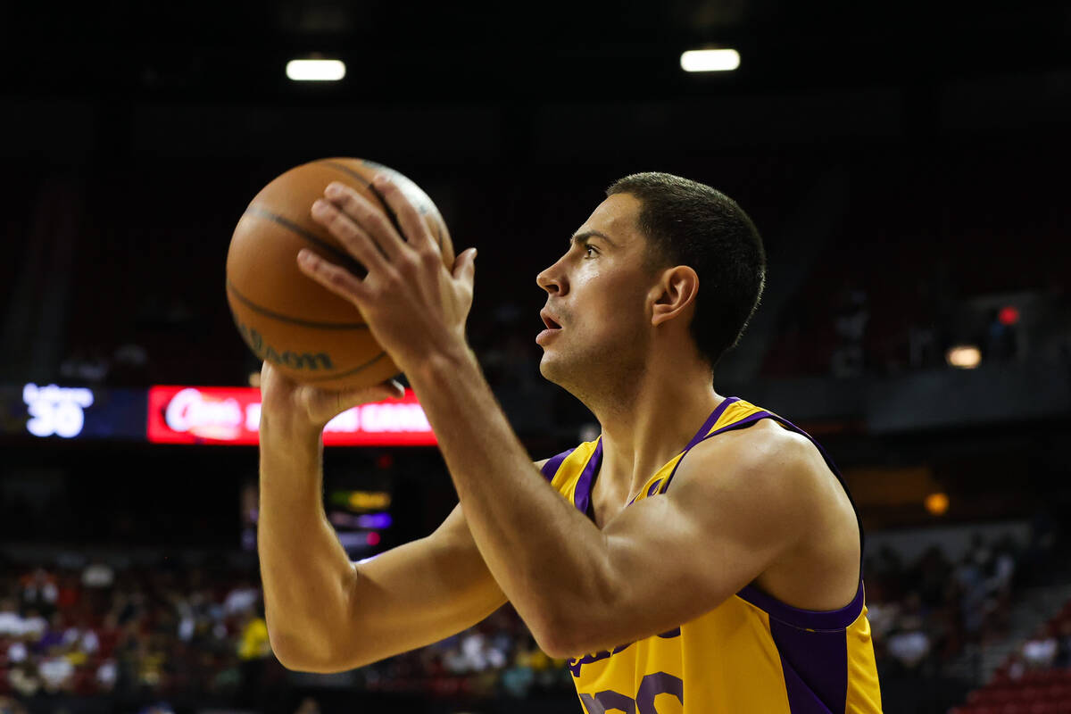 Los Angeles Lakers forward Cole Swider (20) shoots the ball during an NBA Summer League game at ...