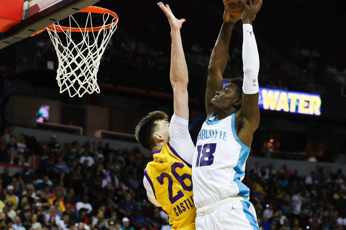 Charlotte Hornets forward Tre Scott (18) attempts to dunk the ball during an NBA Summer League ...