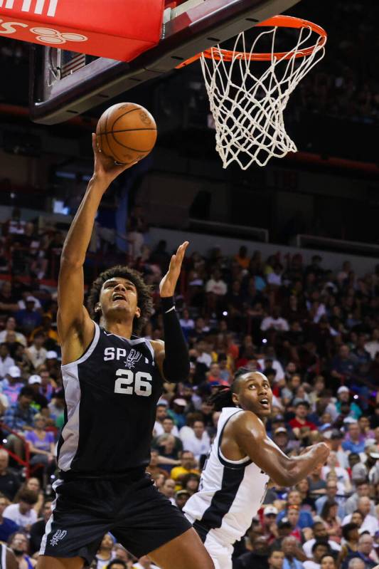 San Antonio Spurs forward Dominick Barlow (26) goes in for a layup during an NBA Summer League ...