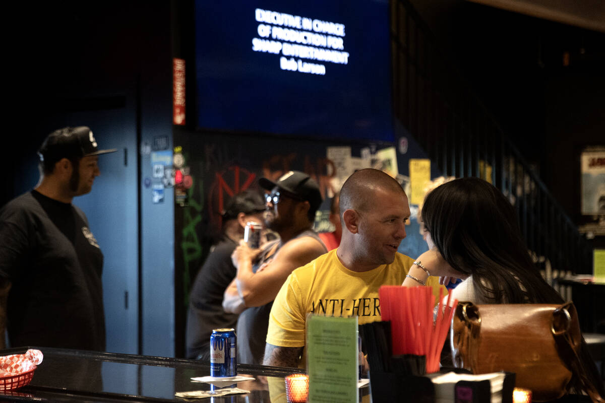 Patrons drink at The Triple Down bar in The Punk Rock Museum on Thursday, July 6, 2023, in Las ...