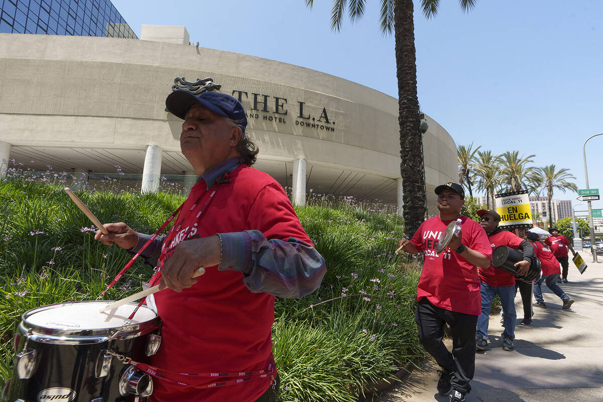 Striking hotel workers rally outside The L.A. Grand Hotel Downtown, Tuesday, July 4, 2023, in d ...