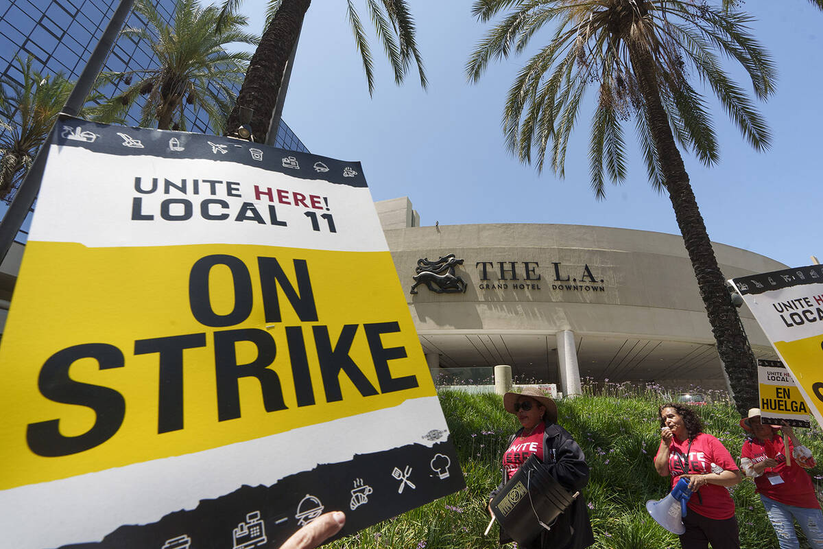 Striking hotel workers rally outside The L.A. Grand Hotel Downtown, Tuesday, July 4, 2023, in d ...