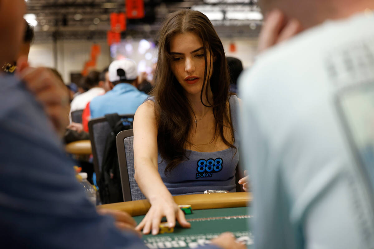 Alexandra Botez gestures as competing with other players during World Series of Poker $10,000 b ...