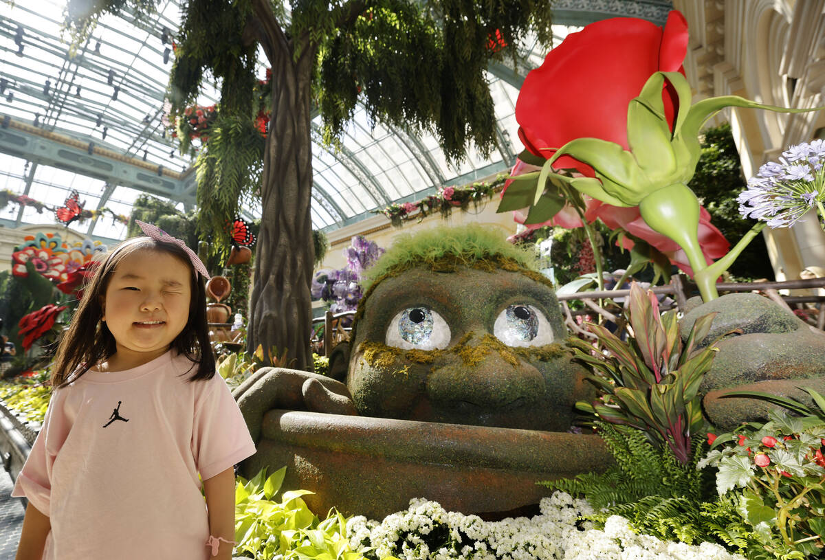 Layoon Kim, 4, of South Korea winks as she poses for a photo at Bellagio’s Conservatory & Bot ...