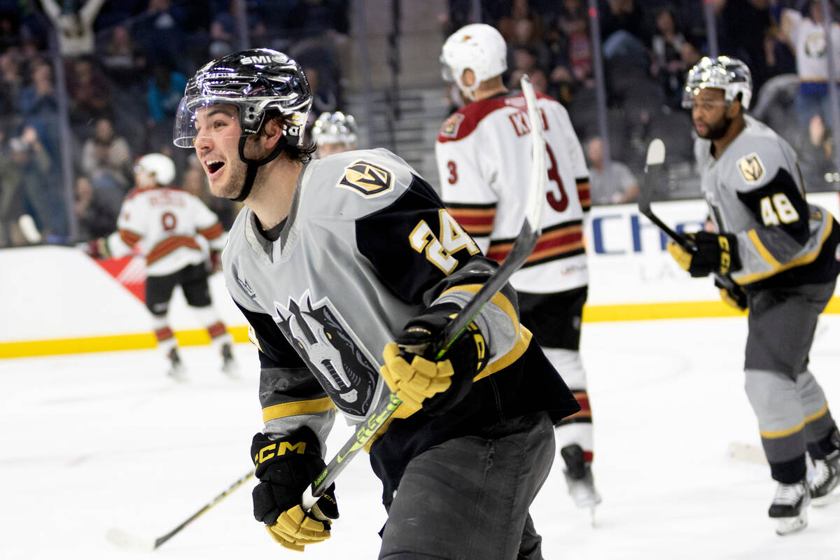 Henderson Silver Knights forward Brendan Brisson celebrates after assisting on a goal during an ...