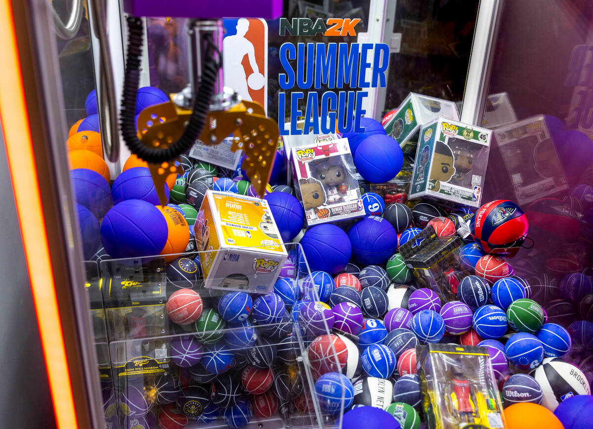 A claw machine offers a chance at merchandise in the concourse during the NBA Summer League at ...