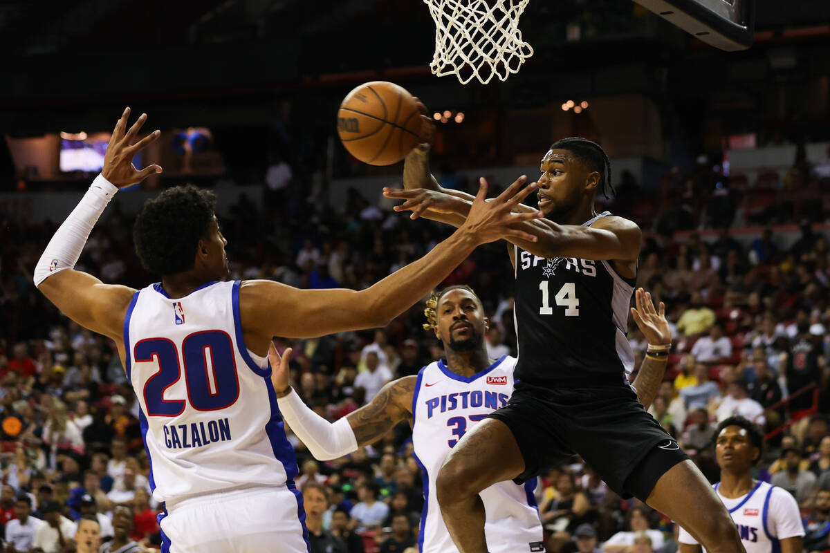 San Antonio Spurs guard Blake Wesley (14) fakes a shot and passes the ball during an NBA Summer ...