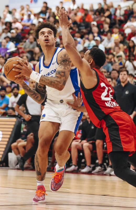 Golden State Warriors forward/center Trayce Jackson-Davis (32) drives the ball towards the hoop ...