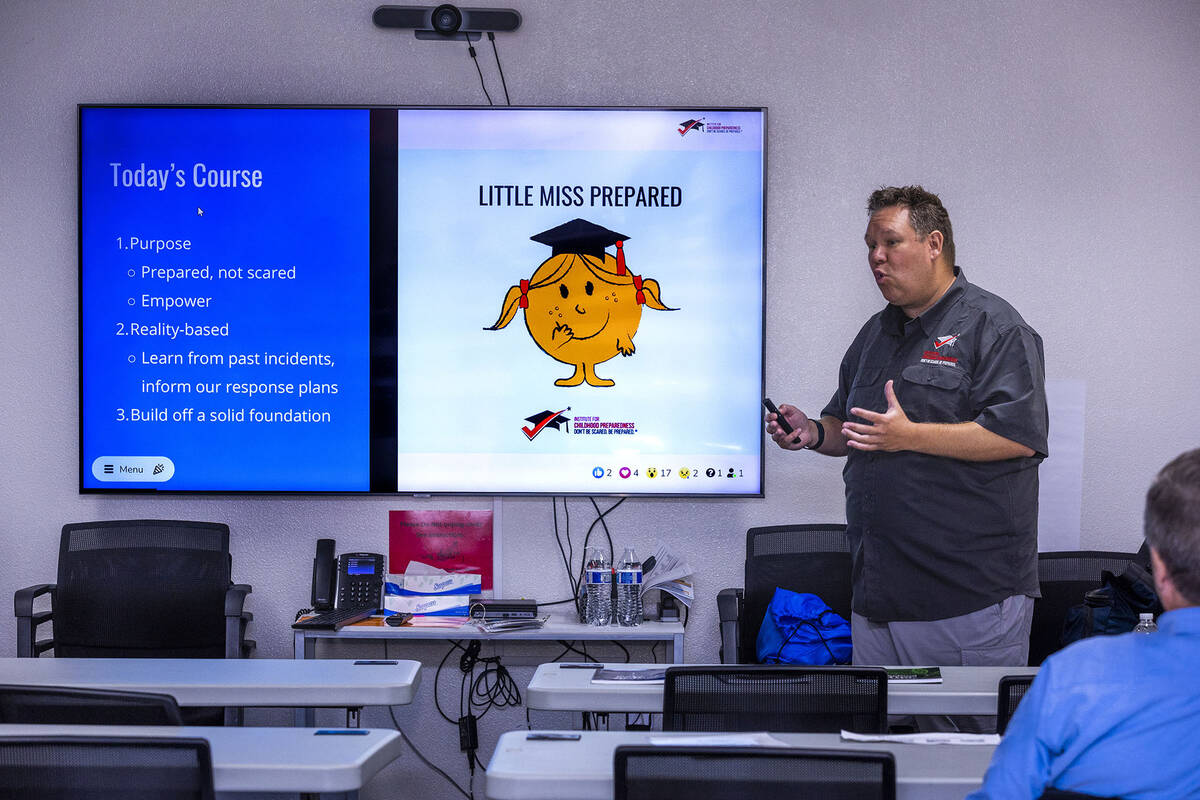 Andrew Roszak with the Institute for Childhood Preparedness conducts active shooter preparednes ...