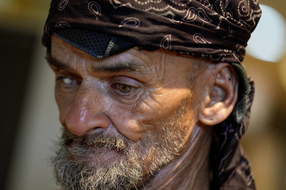 Charles Sanders, 59, cools off inside the Justa Center, Friday, July 14, 2023, in downtown Phoe ...