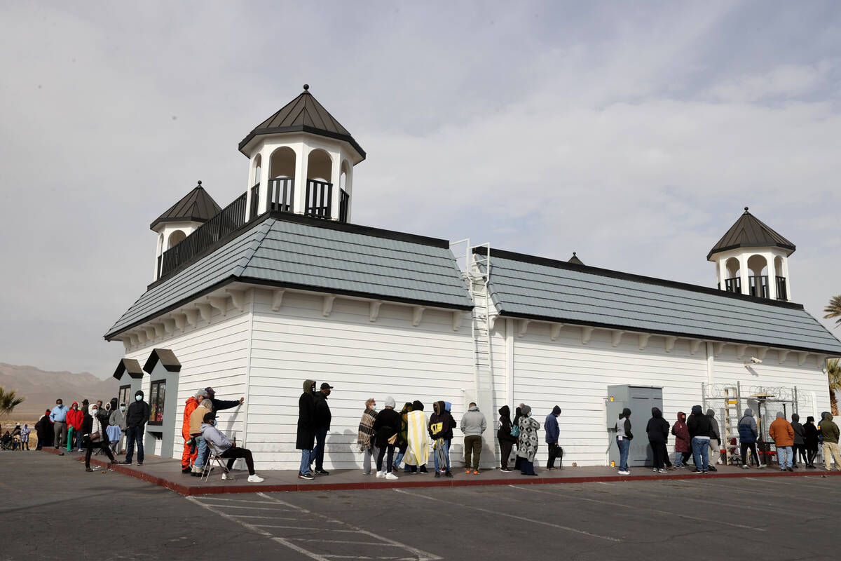 People line up to buy Powerball and Mega Millions lottery tickets at the Primm Valley Lotto Sto ...