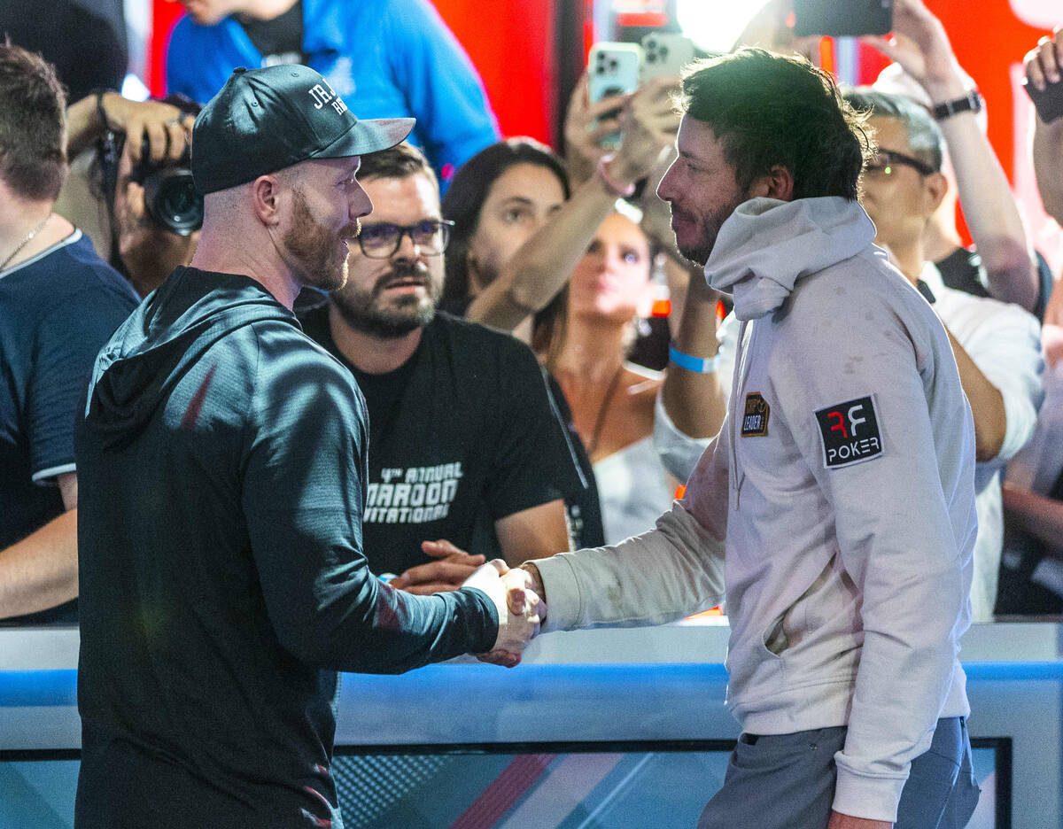 Daniel Weinman, right, shakes hands with Steven Jones after defeated him in winning the World S ...