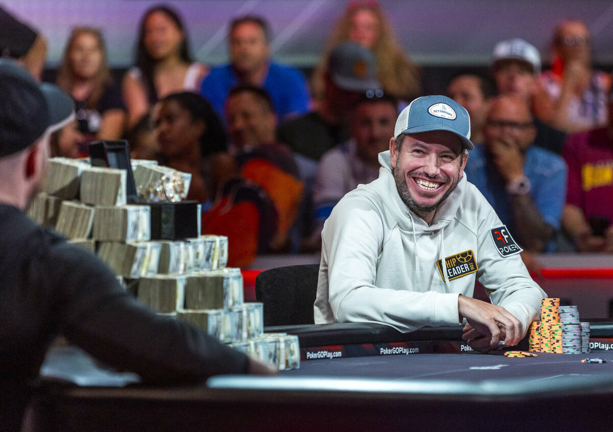 Daniel Weinman, right, shares a laugh with Steven Jones during play of the remaining pair on th ...