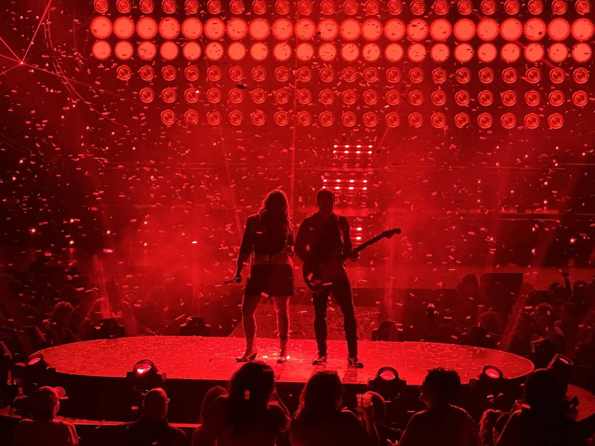 Miranda Lambert and guitarist Ethan Bellinger are shown during Lambert's "Velvet Rodeo" show on ...