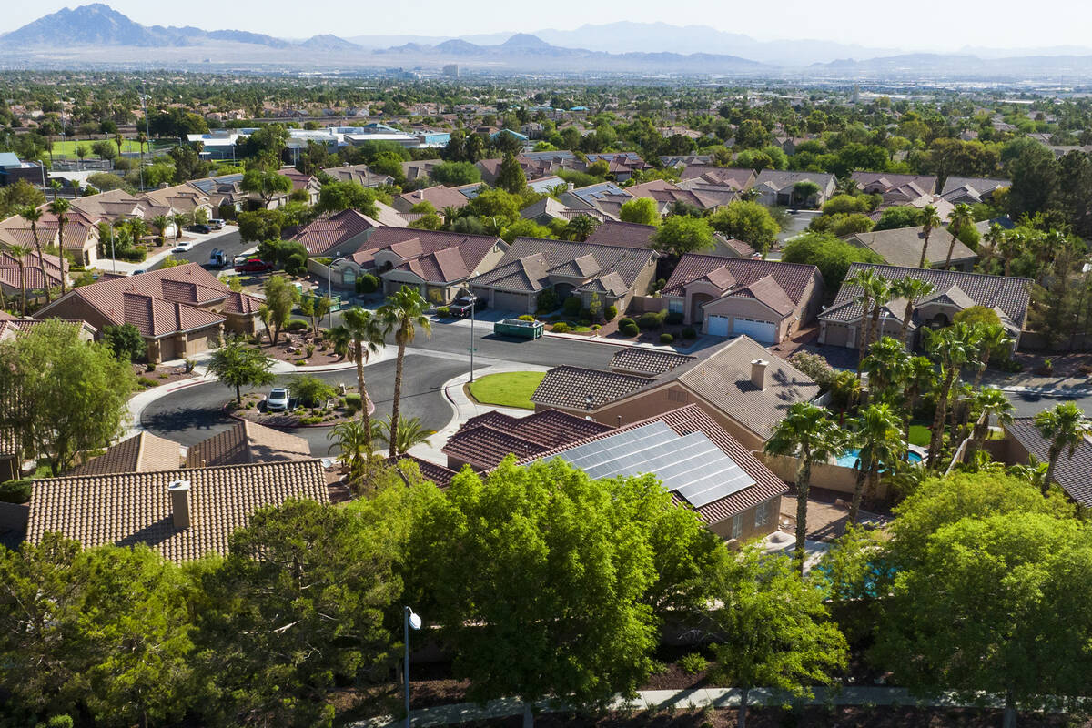 An aerial view shows homes surrounded by trees at Green Valley Parkway on Thursday, July 20, 20 ...