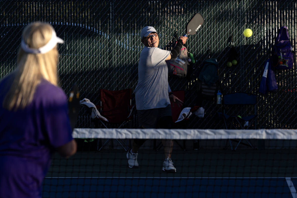 Chee Tan, a member of the Neon Picklers senior team, plays a pickleball match at Aloha Shores P ...