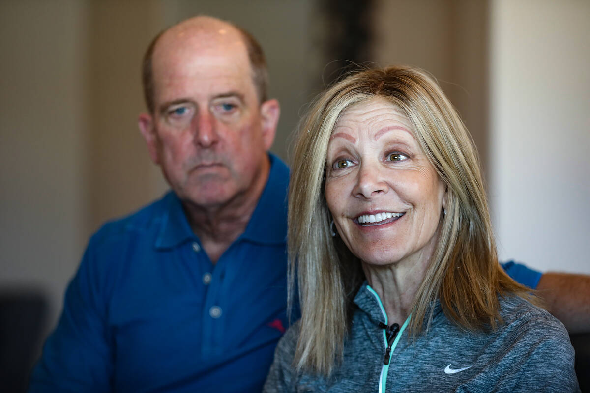 Lynda Brooks-Bracey speaks to the Review-Journal next to her husband Jeff Bracey at their home ...