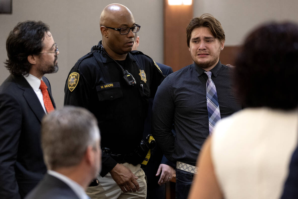 Angelo Loza, right, cries while being taken into custody after he was sentenced to 2 to 8 years ...