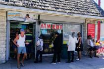 People wait in line to purchase lottery tickets, Wednesday, July 19, 2023, in Hawthorne, Calif. ...