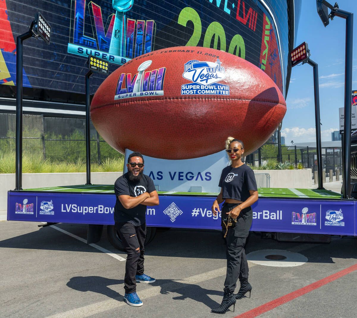 Yeves Perez and Daj'Anique Staples with Workbnb have their photo taken by the Super Ball as the ...
