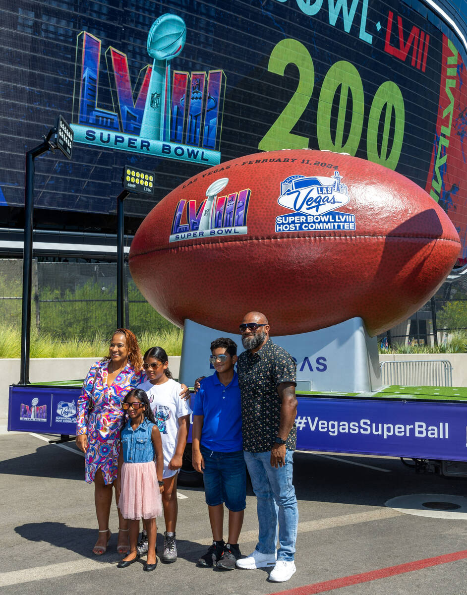 The Batista family with Your Panadas have their photo taken by the Super Ball as the Super Bowl ...