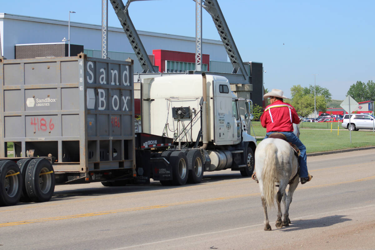A man from Mandaree, North Dakota, rides horseback at a protest in New Town, North Dakota, on M ...