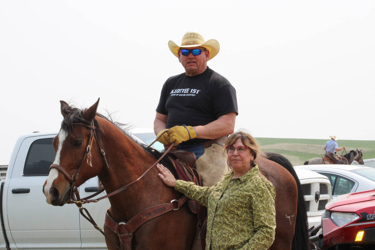 Husband and wife Todd Hall, left, and Patti Jo Hall are photographed on their cattle ranch near ...