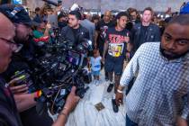 Welterweight boxer Errol Spence Jr., walks in with his son Dallas during grand arrivals inside ...