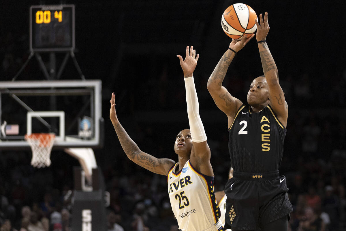 Las Vegas Aces guard Riquna Williams (2) shoots against Indiana Fever guard Tiffany Mitchell (2 ...