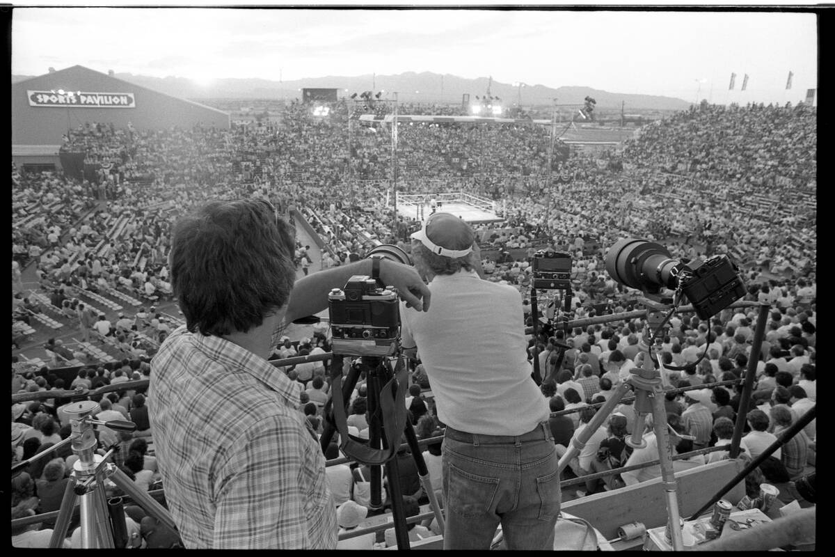 People at the specially constructed outdoor stadium on the tennis courts at Caesars Palace hote ...