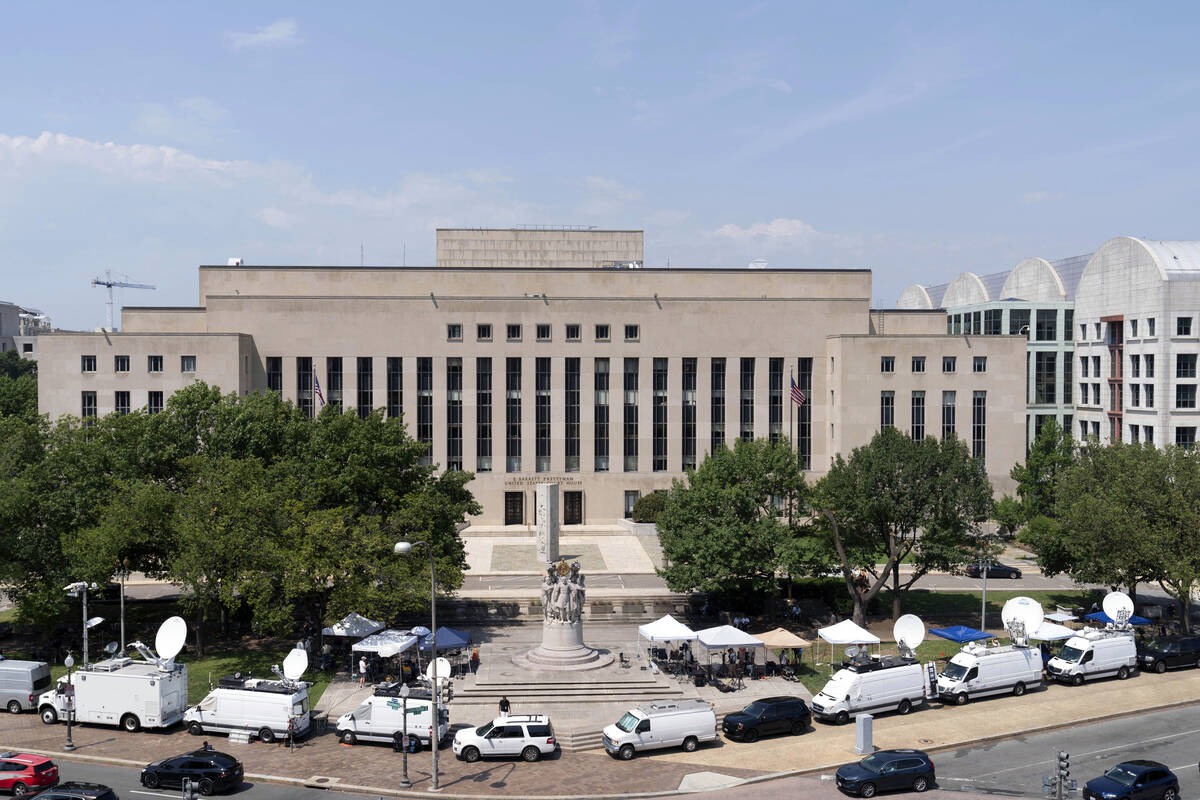 Television news crews set up outside federal court in Washington, on Thursday, July 27, 2023, w ...