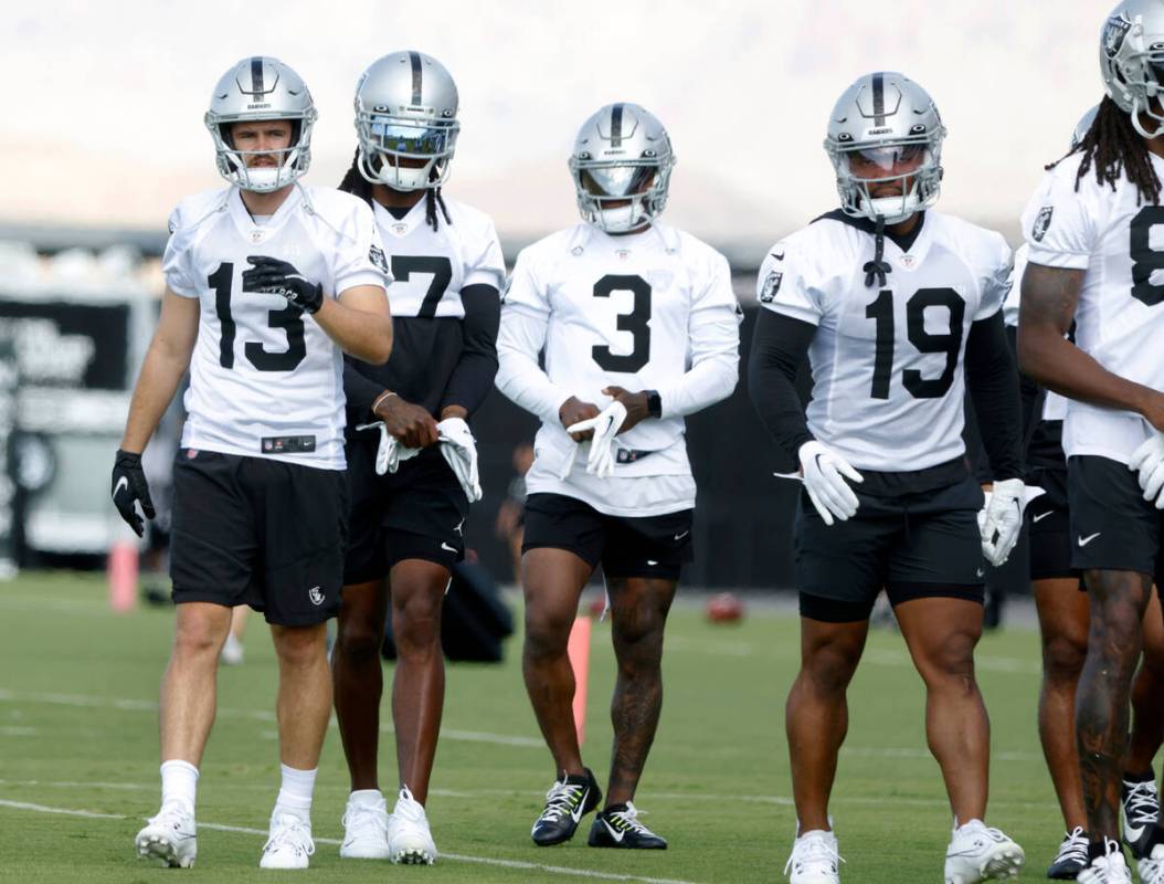 Raiders wide receivers Hunter Renfrow (13) Davante Adams (17) DeAndre Carter (3) and DJ Turner ...