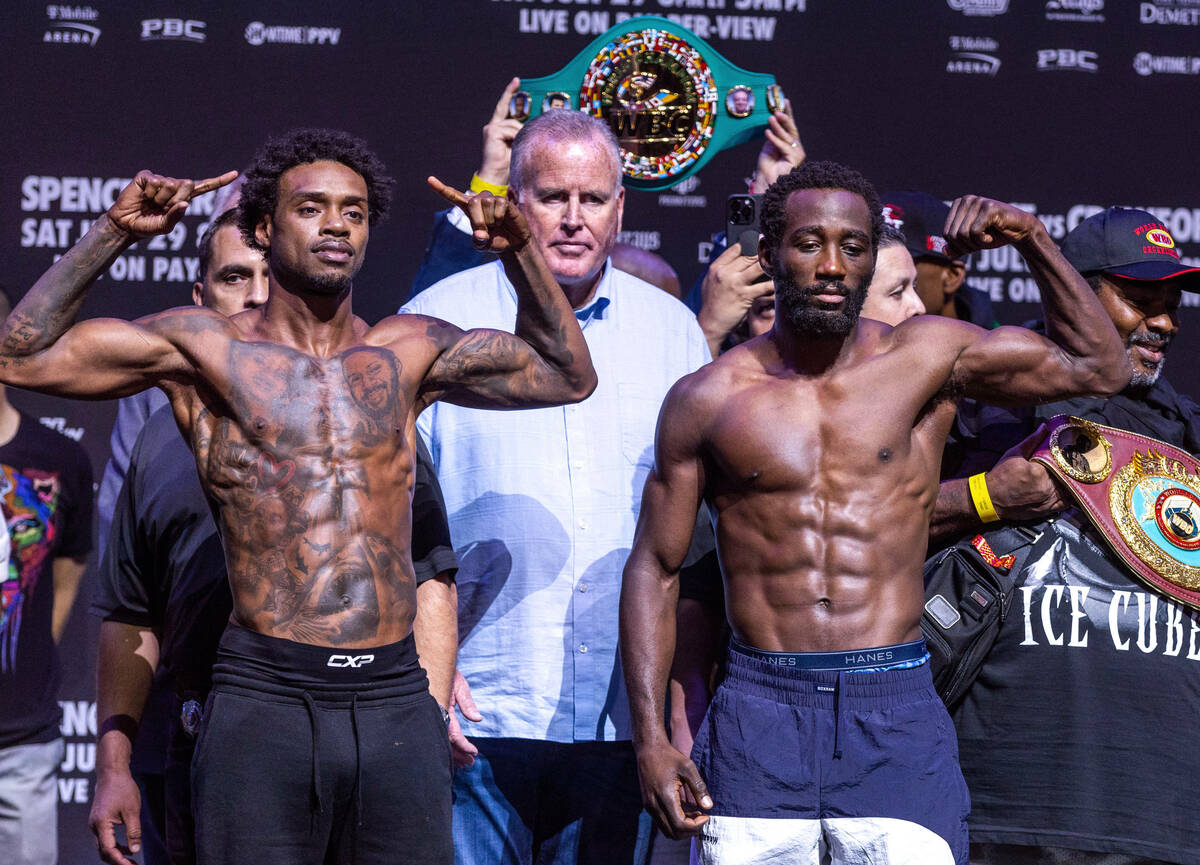 Boxers Errol Spence Jr. and Terence Crawford pose as they come together following their weigh-i ...