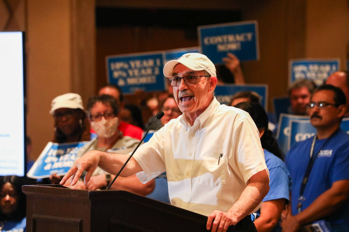 John Vellerdita speaks alongside other teachers and faculty of Clark County School District at ...